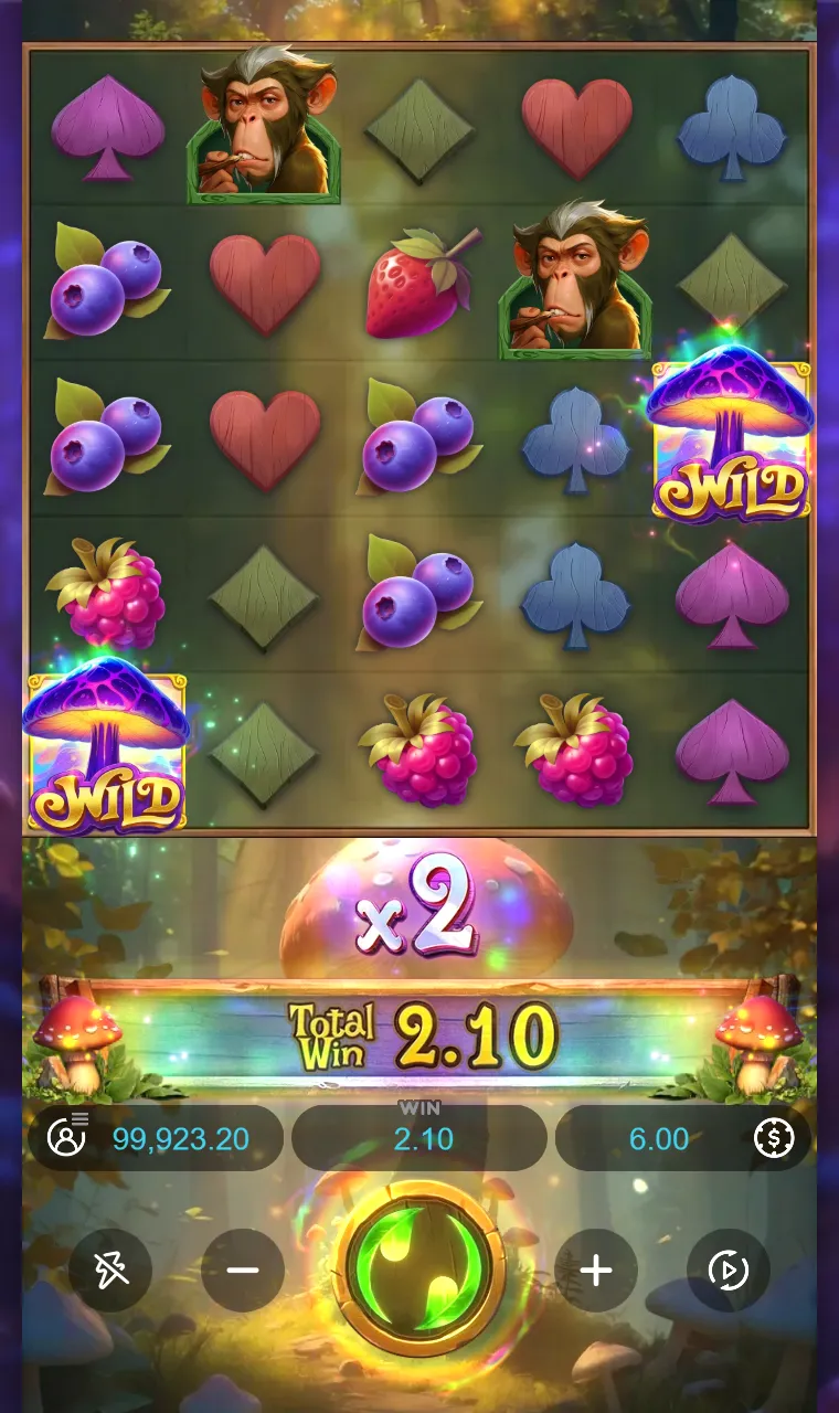 Grade do Monkeys Wild Party com dois cogumelos coringa em cantos opostos, cercados por frutas e naipes, e o multiplicador em x2